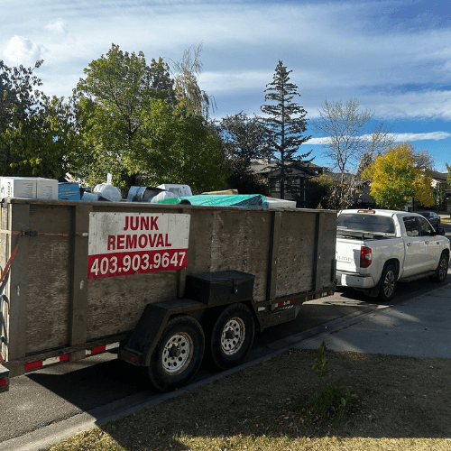 Donation pickup team loading reusable items